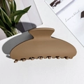 Close-up of a matte khaki brown large hair claw clip on a stylish aesthetic background - Square Shape / PS / Matte Milk Coffee