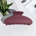 Close-up of a matte burgundy semicircular hair claw clip on a white leather surface - Square Shape / PS / Matte Wine Red