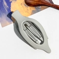 Close-up of matte grey hair claw clip with non-slip teeth on a white textured background - 11.5cm Oval Clip / Matte Beige Gray