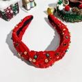 Gros plan du bandeau de Noël en velours rouge avec des perles et paillettes brillantes - Serre-tête de Noël Strass Rouge