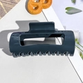 Close-up of a glossy dark grey rectangular hair claw clip with multi-tooth structure - 10.5cm Navy Blue