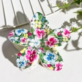 Floral print plumeria hair claw clip with colorful flower patterns on a white background - White Colorful Mini Floral (148-10)