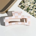 Detailed macro shot of a medium checkerboard hair claw clip in pink and white tones - Pink Checkerboard Style