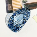 Blue and black leopard print hair claw clip with geometric hollow oval design - Blue Leopard Print Rhombus Clip