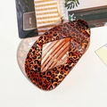 Leopard print oval claw clip with diamond cutout design for elegant hairstyling - Orange Leopard Print Rhombus Clip