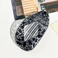 Leopard print acetate curved hair claw with hollow diamond design in black and white - Gray Leopard Print Rhombus Clip