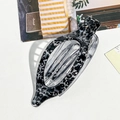 Curved leopard print hair claw clip in white and grey colors with glossy finish - Gray Leopard Print Oval Clip