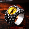 Macro detail of gothic demon eye ring with yellow stone and dragon scale texture - US Size 7 / Yellow