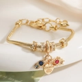 Bracciale a catena serpente dorata con pendenti a cuore e zirconi colorati - Stile Cuore Yes I Do e Gemma Colorata (32118)