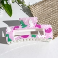 Pink square hair claw clip featuring cute cartoon dinosaur prints for women - Pink Dinosaur Illustration (139-2)
