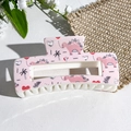Pink square hair claw clip with cartoon dinosaur print and floral background - Pink Dinosaur Palm Tree (139-6)