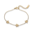 Pulsera minimalista de acero inoxidable chapado en oro 18K con tres dijes de flores - Dorado (32152)