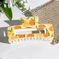 Rectangle hair claw clip with orange fruit pattern on a light yellow base - Orange and Slice Print (147-1) / ABS