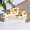 Rectangular hair claw clip with vibrant orange peach print and green leaves - Orange Peach Print (147-5) / ABS