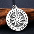 Macro shot of Viking solar wheel pendant with Elder Futhark runes in aged stainless steel - Black Sun Rune Style (BP8-278)