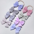 Set of 7 striped bow headbands for babies in assorted colors with soft nylon bands - Multicolor