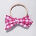 Pink checkered cotton bow on nude elastic nylon headband for babies and infants - Rose Pink