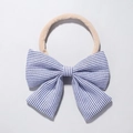 Detail of baby nylon headband with large blue and white striped bow in nautical style - Navy White Striped