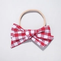 Detail of red and white plaid fabric bow on a soft stretch nylon baby headband - Red White Gingham Style (5)
