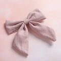 Detail of bamboo cotton texture and stitching on the pink swallowtail bow hair clip - Dusty Rose (9)