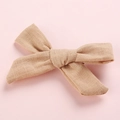 Detailed texture of handcrafted light khaki cotton linen bow hair clip for girls - Khaki