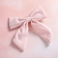 Detail of light pink slub cotton bow hair clip showing textured fabric and stitching - Light Pink (6)