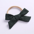 Detailed shot of dark green linen bow headband for babies with white floral pattern - Dark Green