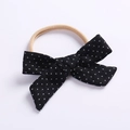 Detail of baby headband with black cotton bow and pink high-elastic nylon hair band - Black