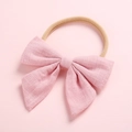 Close-up of soft pink linen cotton bow headband with elastic nylon band for baby girls - Pink (As Shown)