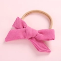 Pink corduroy bow headband for newborn girls with soft tan nylon elastic band - Rose Red