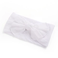 Close-up of white wide nylon headband with a large soft handmade bow for babies - White