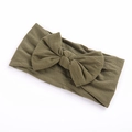Detail of soft olive green nylon baby headband with stretchable knotted bow design - Army Green