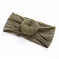 Detail of army green nylon baby headband featuring a soft donut knot texture - Army Green