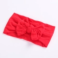 Elastic nylon baby headband featuring a large bright red bow for infants and toddlers - Red