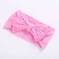 Dettaglio della fascia per neonata con grande fiocco rosa e bordo di pompon - Rosa Acqua