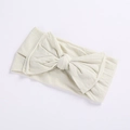 Soft elastic baby wide headband featuring a large bow in cream white color - Off-White