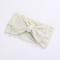 Elastic baby headband with a large cream bow in soft knit fabric for comfortable wear - Bowknot Headband / Off-White