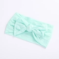 Soft mint green baby headband featuring a large hand-knotted bow on elastic fabric - Bowknot Headband / Verdant