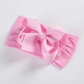 Detail of soft pink nylon headband with a large ribbed grosgrain ribbon bow for babies - Water Pink
