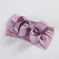 Detail of soft lilac nylon baby headband with a large textured grosgrain ribbon bow - Taro Purple