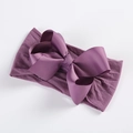 Close-up of deep purple baby headband with soft nylon base and oversized ribbed bow - Light Purple