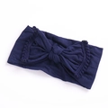 Zachte donkerblauwe baby haarband met grote strik en pompon-kantafwerking - 11 Tibetaans Blauw