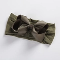 Detail view of olive green grosgrain ribbon bow on soft nylon headband for babies - Army Green