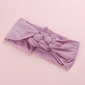 Détail du tissu en nylon élastique doux avec un nœud tressé central de couleur lilas - Violet Taro
