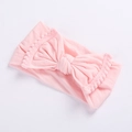 Roze geribbelde baby hoofdband met grote strik en decoratieve pom-pom kanten rand - 30 Oudroze