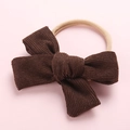 Détail du bandeau à nœud en velours côtelé marron café avec élastique en nylon pour bébé - Marron