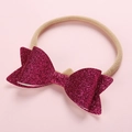 Elastic nylon baby headband with a deep purple glitter sequin bow for festive styling - Dark Red