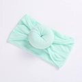 Soft mint green nylon baby headband with a donut knot design for infants - 26 Emerald Green