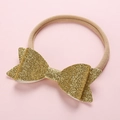 Detail of baby headband with gold glitter bow and soft nude nylon elastic band - Light Gold Color