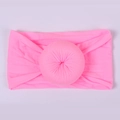 Neon pink donut baby headband with wide soft nylon stretch fabric and round ball knot - Peach Pink